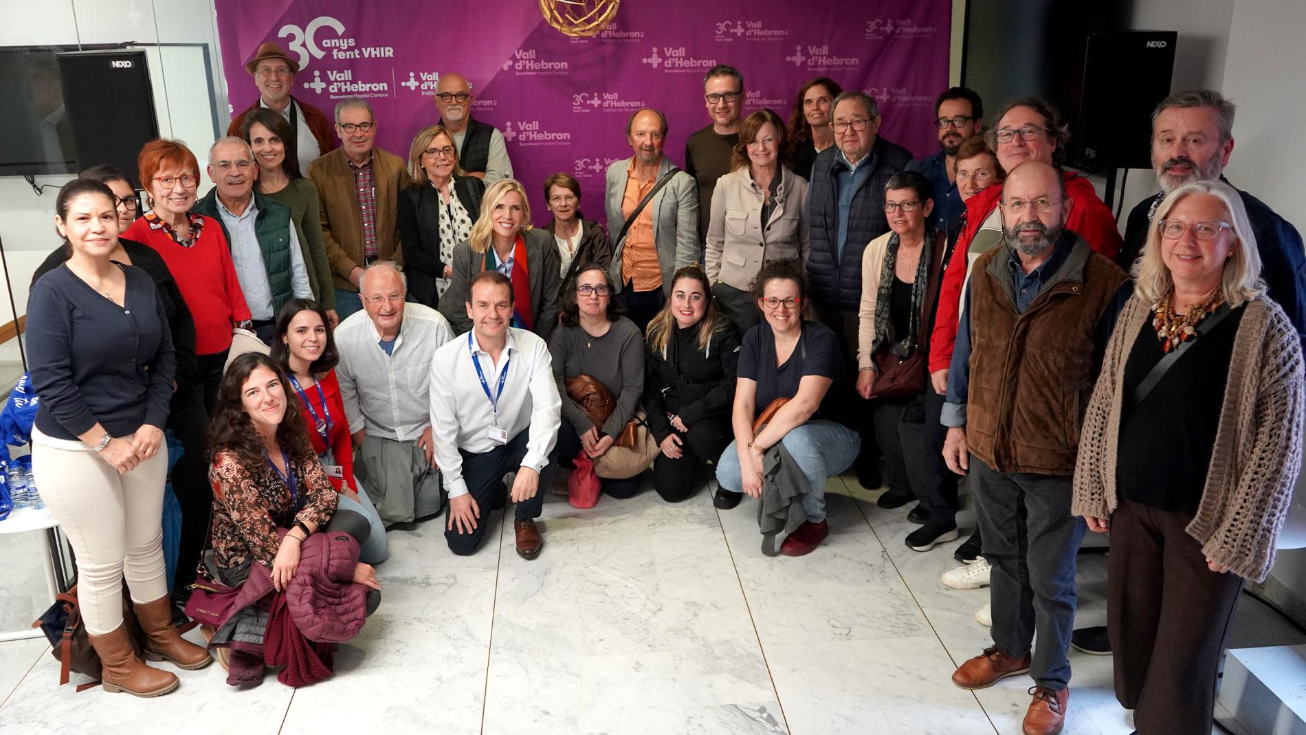 Ponents i assistents a la xerrada 'La importància de la solidaritat en la recerca'